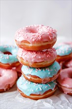 Stack of donuts with pastel pink and blue glazing. KI generiert, generiert, AI generated