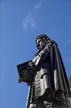 Inner courtyard of Leipzig University with the monument to Gottfried Wilhelm Leibniz, Leipzig,