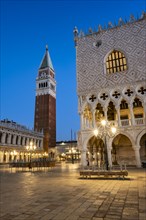 Illuminated Doge's Palace and Campanile bell tower in Piazetta San Marco, blue hour, St Mark's