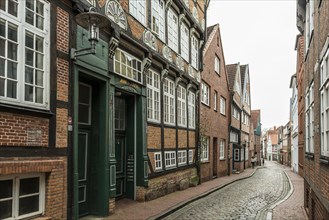 Half-timbered houses and alley in the old town, Buxtehude, Altes Land, Lower Saxony, Germany,