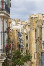 Old architectural apartment buildings with Maltese balconies, Valletta, Malta, Europe