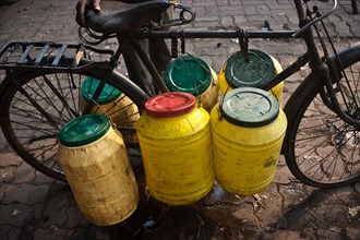 Plastic barrels, water, draw, public water pump, Jharkhand, India, Asia