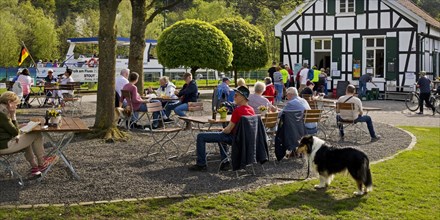 People at the Royal Lockkeeper's House on the Ruhr with the motor vessel MS Schwalbe II, Witten,