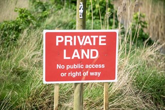 Private Land No public access or right of way sign, in countryside, Alderton, Suffolk, England, UK