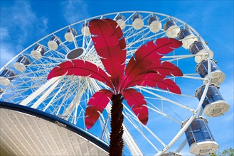 Ferris wheel with red metal Palm tree, Spring Festival Deggendorf, Lower Bavaria, Bavaria, Germany,