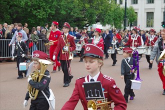 A marching band with young people on the streets, folklore, bank holidays 17 May, Norwegian flag,