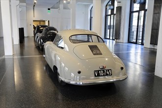 Rear view of a grey Porsche 356 Coupe in an exhibition hall, AUTOMUSEUM PROTOTYP, Hamburg,