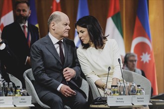 (R-L) Annalena Baerbock (Alliance 90/The Greens), Federal Foreign Minister, and Olaf Scholz (SPD),