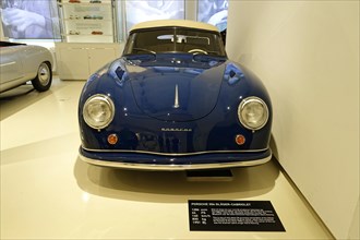 PORSCHE 356 GLASS CABRIOLET, A dark blue Porsche 356 Cabriolet presents itself in style in a car