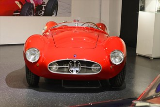 MASERATI A6GCS 53, A red Maserati racing car with a sporty design exhibited in a classic car