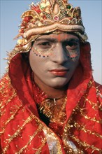 Portrait, bahrupiya, India, tradition, face painting, street performer, impersonating goddess