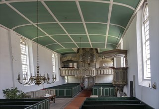 Protestant Reformed Church from 1401, interior with pews, pulpit and organ, Greetsiel, Krummhoern,