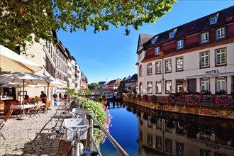 Strasbourg, France, September 2023: Historical city center called 'Petit France' and river on sunny