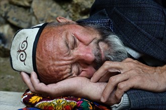Sleeping Kyrgyz man, Kyrgyzstan, Asia