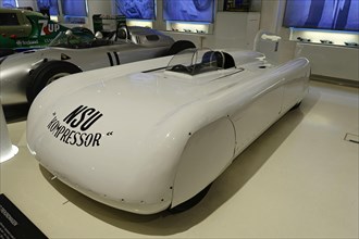 NSU WELTRECORDWAGEN, A white vintage racing car with NSU Kompressor inscription on display in the