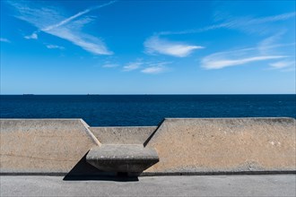 Concrete benches on the Moll de Llevant waterfront promenade, a 4.5 km long promenade for joggers,