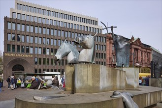 Neptune Fountain by sculptor Waldemar Otto and the Bremer Landesbank at the Domshof in Bremen,