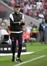 Coach Thomas Tuchel FC Bayern Munich FCB on the sidelines clapping his hands in encouragement,