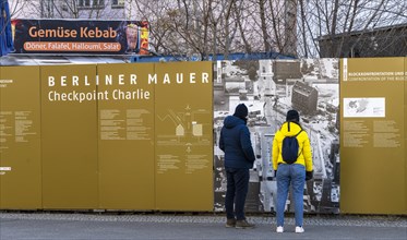 Information board and building of the Mauermuseum at Checkpoint Charlie, Berlin, Friedrichstrasse,