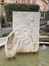Head, artistic sculpture in a fountain, Sassari, Sardinia, Italy, Europe