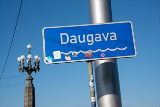 Sign with the inscription Daugava, flows through Russia, Belarus and Latvia, flows into the Baltic
