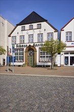 Swan pharmacy in the city centre of Husum, Nordfriesland district, Schleswig-Holstein, Germany,