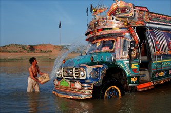 Bus washing, river, sindh province, Pakistan, Asia