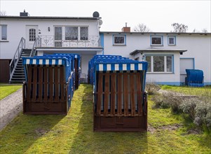 Row of blue beach chairs in a front garden, Ruegen, Mecklenburg-Vorpommern, Germany, Europe