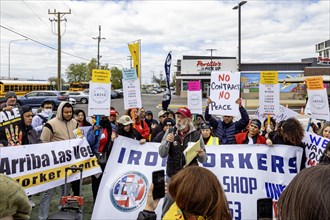 Rosemont, Illinois, Hundreds of workers and supporters picketed a Portillo's restaurant, demanding