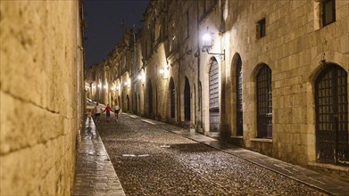 Knights Street, An empty street with historical buildings is illuminated at night, night shot,