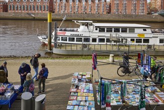 Passenger ship Hanseat and flea market on the Weser promenade, the Schlachte, in Bremen, Hanseatic