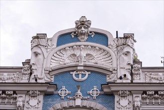 Art Nouveau building, designed by Michail Eisenstein, blue facade with sculptures, Riga, Latvia,