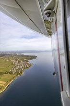 Flight in a zeppelin along the shore of Lake Constance, aerial view, Hagnau, Baden-Wuerttemberg,