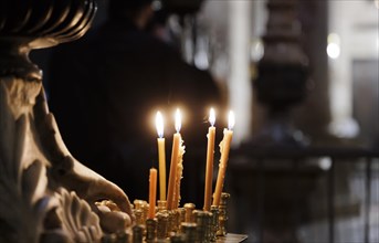 Candles in the Church of the Holy Sepulchre in the Old City of Jerusalem, Jerusalem, 23.04.2024