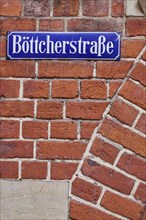 Street sign Boettcherstrasse on a brick facade in Bremen, Hanseatic city, federal state of Bremen,