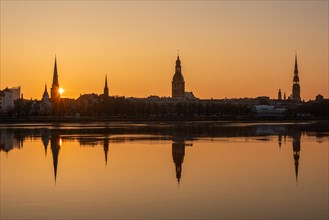 Sunrise in Riga with a view over the Daugava River, St James Cathedral, Riga Cathedral, St Peter's