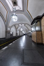 Historic underground station with tiled walls and vaulted ceiling structure, Heidelberger Platz,