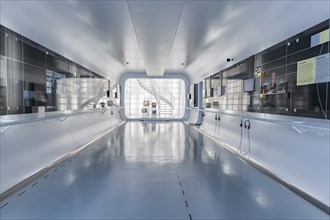 Futuristic interior of a modern building with white corridor, Deutsche Kinematik, Berlin, Germany,