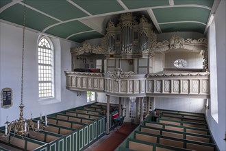 Protestant Reformed Church from 1401, interior with pews and organ prospectus above the east