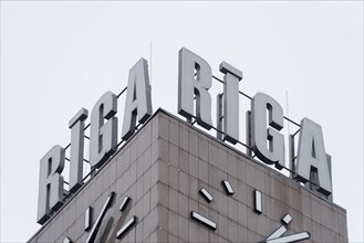 Clock at the main railway station with the lettering Riga, considered a landmark of the Latvian