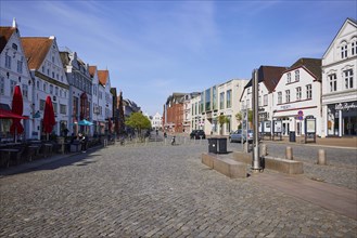 Large street and shopping street in the city centre of Husum, Nordfriesland district,
