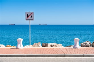 No fishing sign on the Moll de Llevant promenade, a 4.5km long promenade for joggers, walkers,