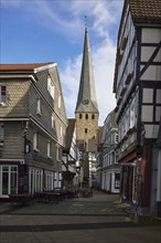 Access between half-timbered houses with staircase to St George's Church in Hattingen, Ennepe-Ruhr