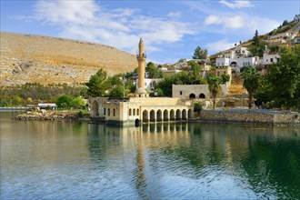 Partly submerged mosque of Eski Halfeti due to the construction of the Birecik dam on the Euphrates