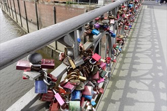 Love locks, Speicherstadt, Hamburg, Germany, Europe, A bridge railing filled with colourful love