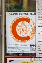 C Grade, (Poor) official hygiene rating of a restaurant, Chinatown, Manhattan, New York City