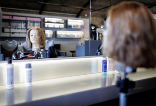A training head for hairdressers, taken in the hairdressing salon Coiffeur Sivan in Berlin,