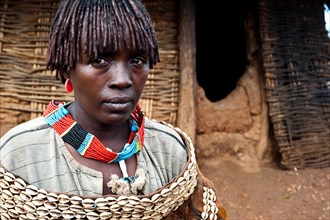 Banna tribe woman, hut, Omo valley, Ethiopia, Africa