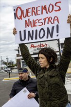 Rosemont, Illinois, Hundreds of workers and supporters picketed a Portillo's restaurant, demanding