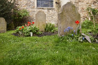 Historic graves and gravestones at St George's Church in the old town of Hattingen, Ennepe-Ruhr